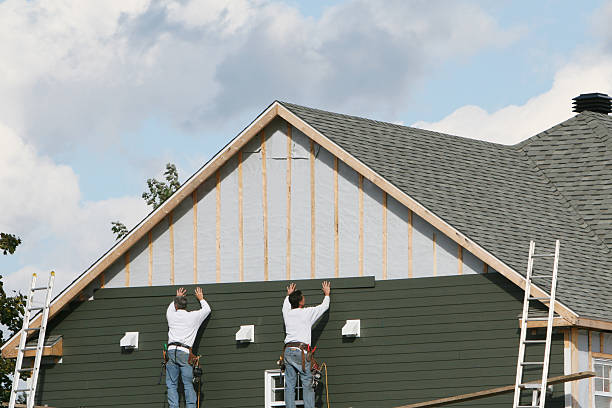 Professional Vinyl Siding technician working in Newton, IL